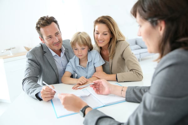 Family meeting real-estate agent to buy new home