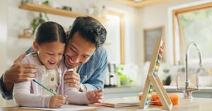 dad with child doing homework