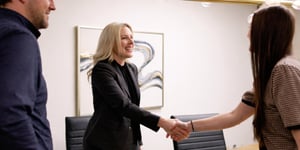 shaking hands at law firm