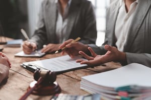 lawyer signing documents